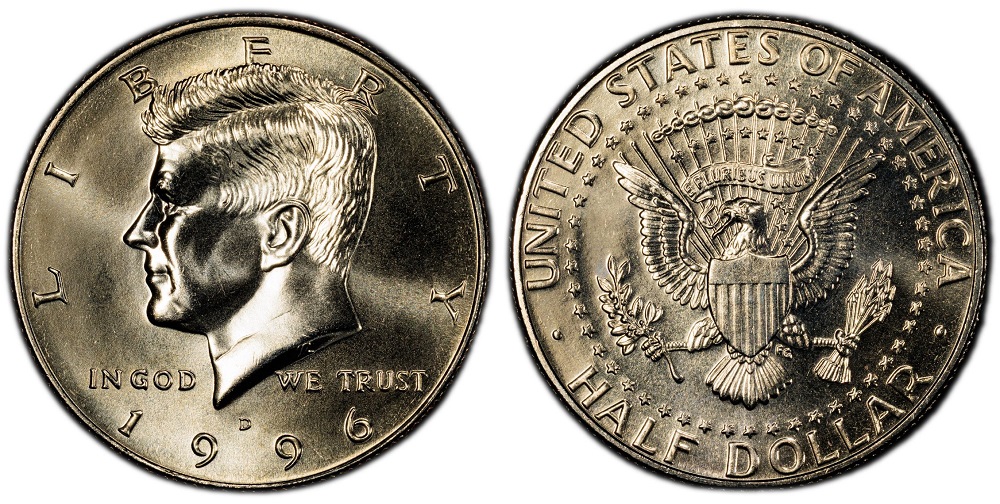 Grading strip showing four 1996 Kennedy half dollars from worn to gem uncirculated with grade labels